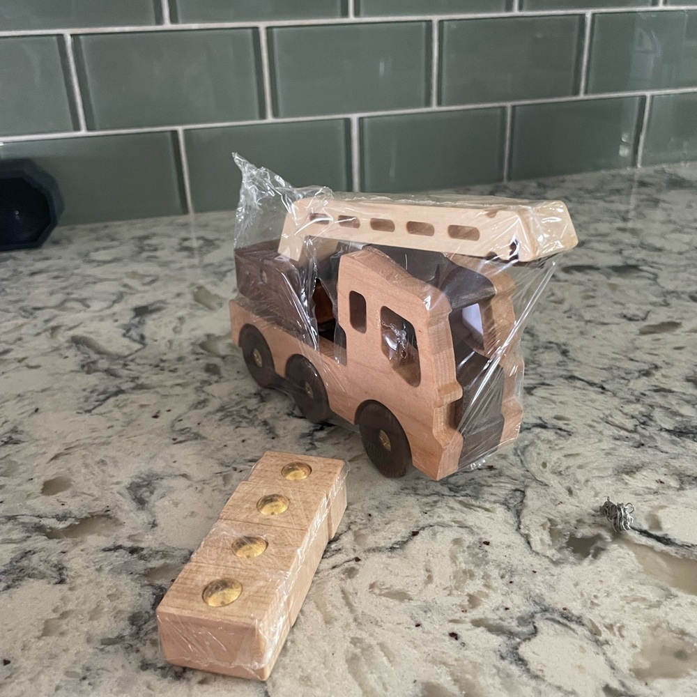 Wooden crane toy with blocks